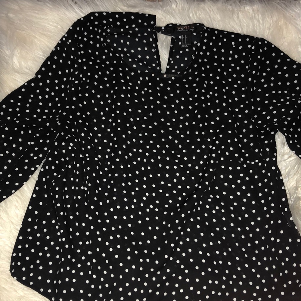 Black polka dot blouse